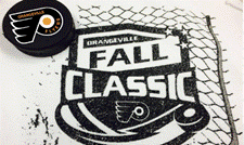 A hockey puck next to a hockey puck Description automatically generated